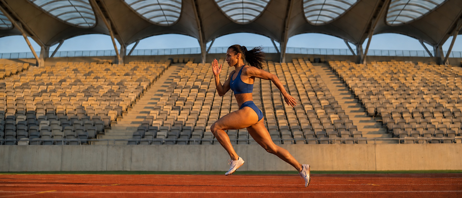 Sprinter mid-stride on the track — TrackStat video analysis